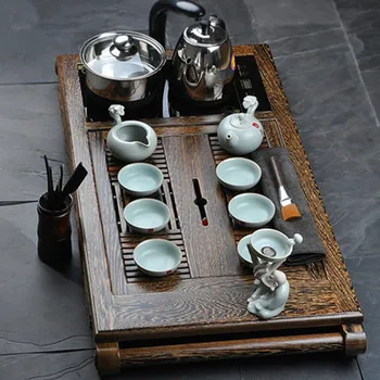 Chicken Wing Wooden Tea Tray Complete Set Of Four-in-one Solid Wood Large Drawer Type Tea Sea Induction Cooker Ceramic Tea set
Chicken Wing Wooden Tea Tray Complete Set Of Four-in-one Solid Wood Large Drawer Type Tea Sea Induction Cooker Ceramic Tea set