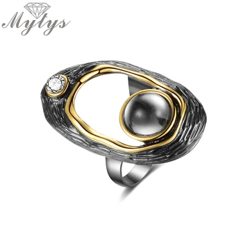 Mytys Black Gun Hollow Design Old Vintage Ring Black Pearl Gold Wire Frame Crystal Embellishment R2161
Mytys Black Gun Hollow Design Old Vintage Ring Black Pearl Gold Wire Frame Crystal Embellishment R2161