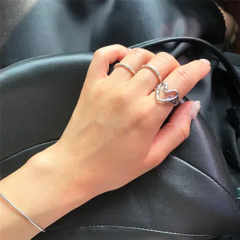POFUNUO Real 925 Sterling Silver European Style Women Hollow Heart Chic Rings Cool Cold Wind Knoting Weaving Niche Opening Rings 
POFUNUO Real 925 Sterling Silver European Style Women Hollow Heart Chic Rings Cool Cold Wind Knoting Weaving Niche Opening Rings