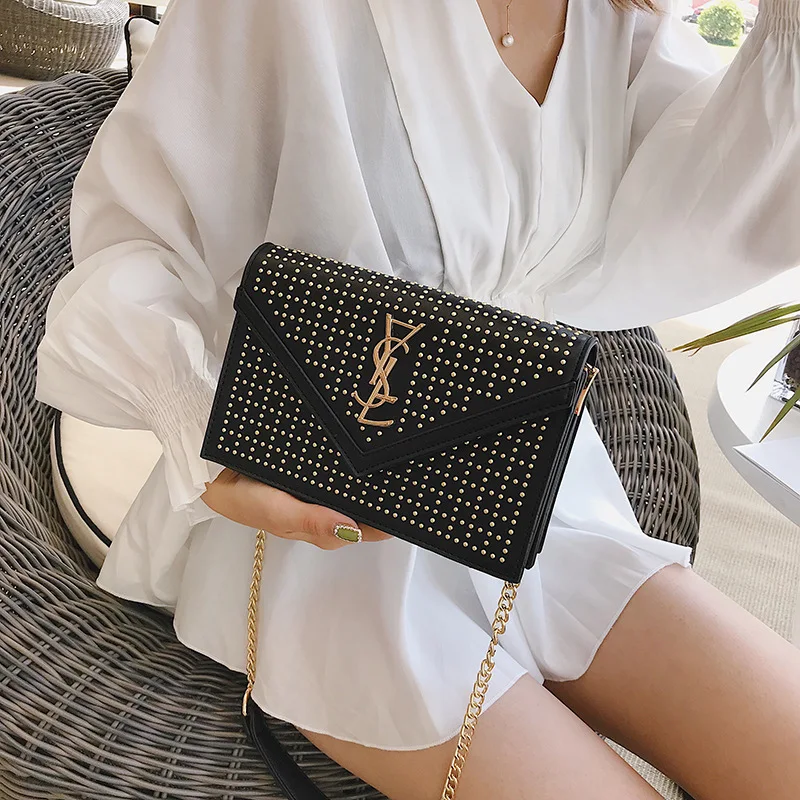 Autumn women's bag 2019 new fashion atmospheric rivet small square bag chain bar slant span bag ladies Europe