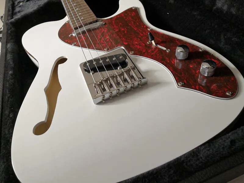 Semi-hollow telr guitar F hole White color Red Pickguard Rosewood fretboard Chrome Hardwares,customized!T-9
Semi-hollow telr guitar F hole White color Red Pickguard Rosewood fretboard Chrome Hardwares,customized!T-9