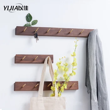 Nordic solid wood hanger wall hanging wall creative brass coat hook porch coat hat hook door hook
Nordic solid wood hanger wall hanging wall creative brass coat hook porch coat hat hook door hook