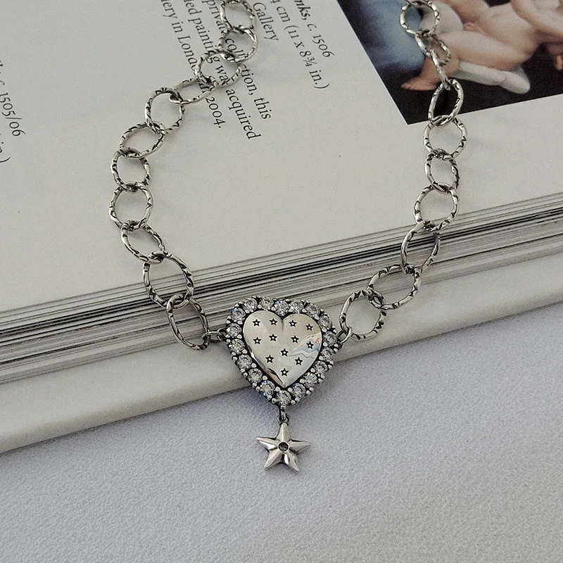 Far Vatican S925 Fine Silver Retro Retro Thai Silver Heart Necklace Tassels Star Choker Necklace Women's New Products
Far Vatican S925 Fine Silver Retro Retro Thai Silver Heart Necklace Tassels Star Choker Necklace Women's New Products