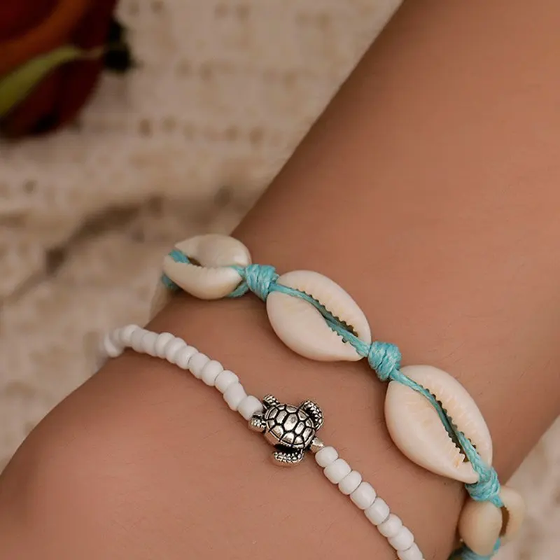 New Shell Bracelet Handmade Beaded Rope Natural Shell Bracelet Female Summer Beach Resort Set Turtle Bracelet
New Shell Bracelet Handmade Beaded Rope Natural Shell Bracelet Female Summer Beach Resort Set Turtle Bracelet