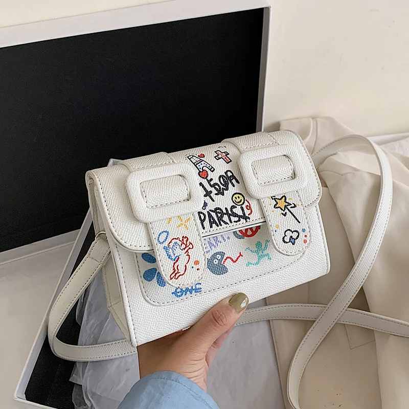 Small Women Shoulder Bag Graffiti Cartoon Pattern Purses and Handbag Summer Fashion Print Mini Crossbody Sling Bag
Small Women Shoulder Bag Graffiti Cartoon Pattern Purses and Handbag Summer Fashion Print Mini Crossbody Sling Bag