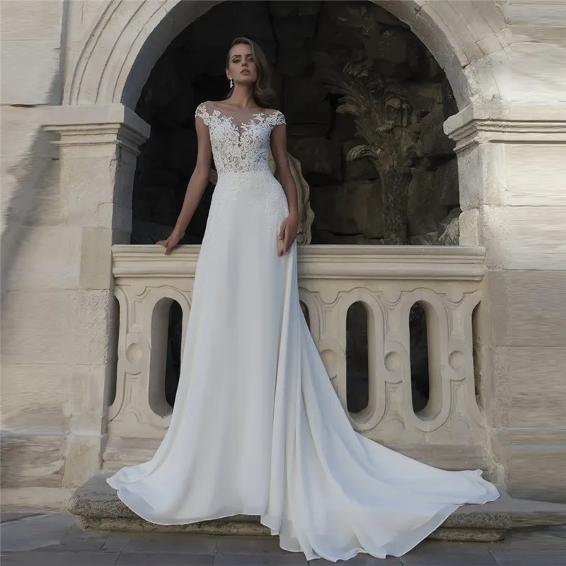Sheer Short Sleeves A-Line Lace Appliques Wedding Dresses Buttons Back Bridal Gowns 2021 Sexy Long Formal Beach Simple
Sheer Short Sleeves A-Line Lace Appliques Wedding Dresses Buttons Back Bridal Gowns 2021 Sexy Long Formal Beach Simple