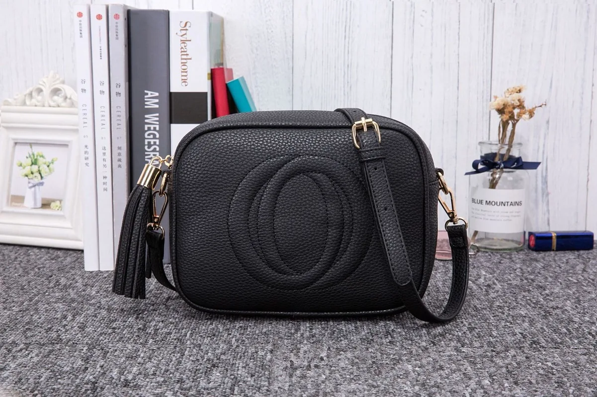 2019 Europe&The New Fashion Network Red with The Mini Shoulder Slung Tassel Handbag Magnetic Buckle Small Square Bag handbag
2019 Europe&The New Fashion Network Red with The Mini Shoulder Slung Tassel Handbag Magnetic Buckle Small Square Bag handbag