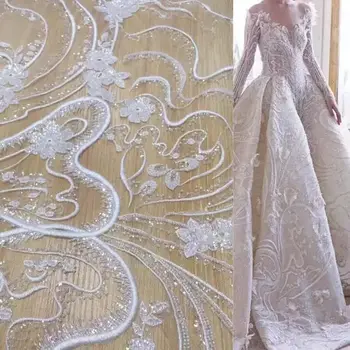 Off white bridal tulle lace with beads french net sewing fabric with top quality embroidered lace fabric
Off white bridal tulle lace with beads french net sewing fabric with top quality embroidered lace fabric