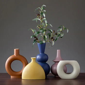 New Design Colorful Ceramic Flower Vase Nordic Irregular Flower Vase Living Room Decoration Plants Container Wedding Ornaments
New Design Colorful Ceramic Flower Vase Nordic Irregular Flower Vase Living Room Decoration Plants Container Wedding Ornaments