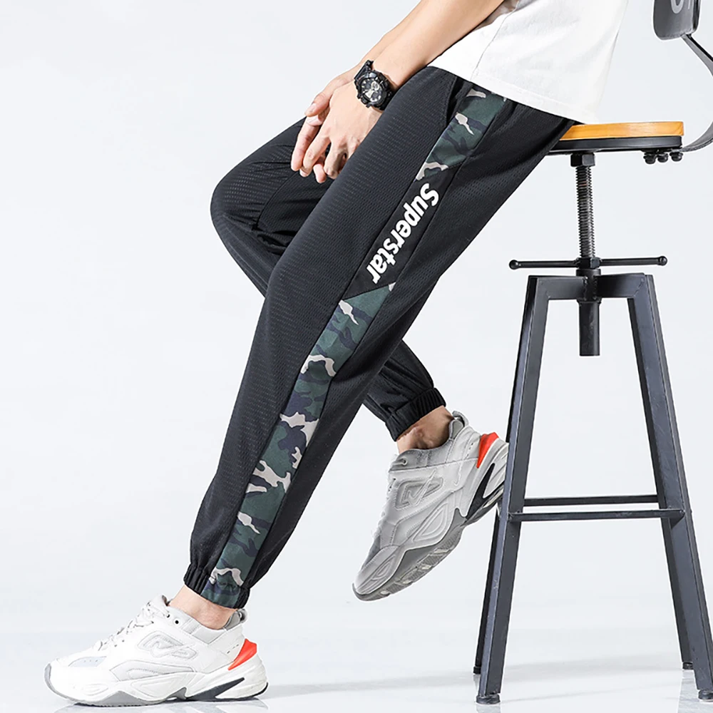 Summer super thin ice mesh sports pants men's Leggings loose high elastic quick dry casual pants 9-point Harun pants 
Summer super thin ice mesh sports pants men's Leggings loose high elastic quick dry casual pants 9-point Harun pants