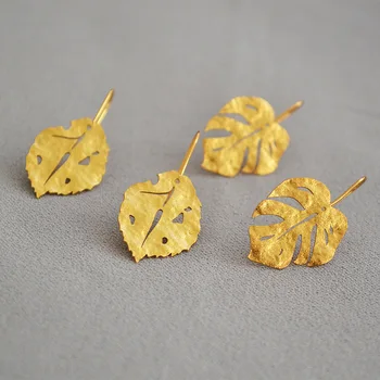European and American fashionable frosted retro-gold leaf cold-style earrings 
European and American fashionable frosted retro-gold leaf cold-style earrings