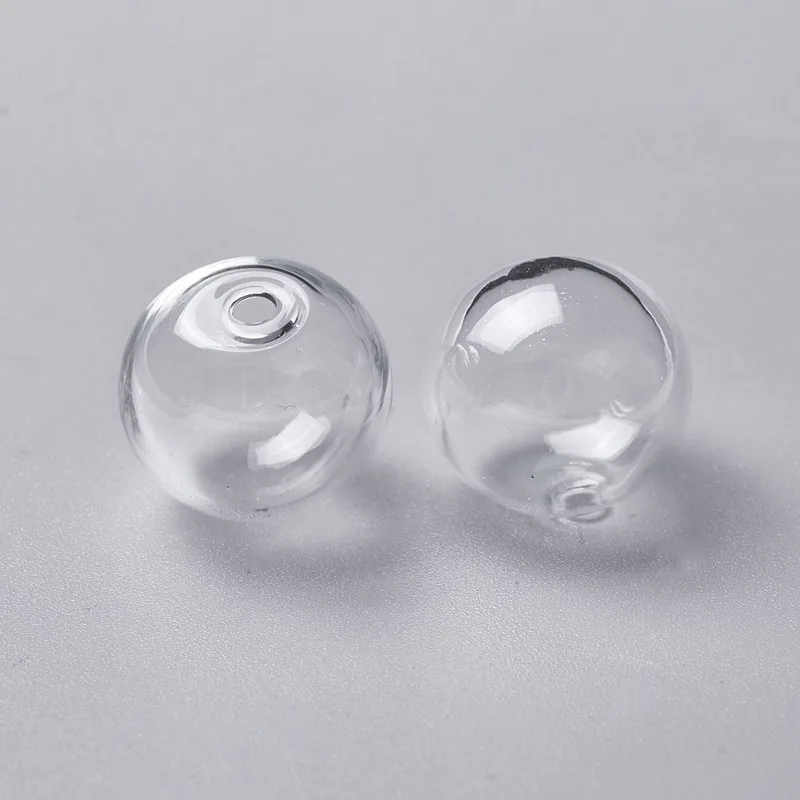 100pcs/lot 16mm Transparent Clear Round Handmade Blown Glass Globe Beads with 2mm Hole for DIY Jewelry Earring Decoration Making 
100pcs/lot 16mm Transparent Clear Round Handmade Blown Glass Globe Beads with 2mm Hole for DIY Jewelry Earring Decoration Making