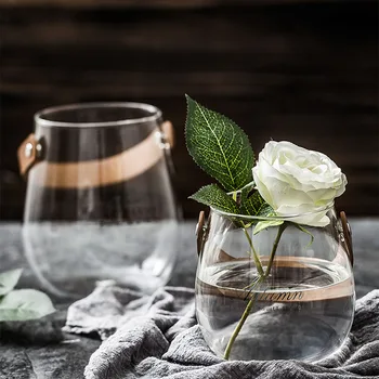 Nordic Clear Glass Storage Jar Portable Leather Handle Dry Flower Table Vase Scandinavian Desk Organizer Container Home Decor
Nordic Clear Glass Storage Jar Portable Leather Handle Dry Flower Table Vase Scandinavian Desk Organizer Container Home Decor