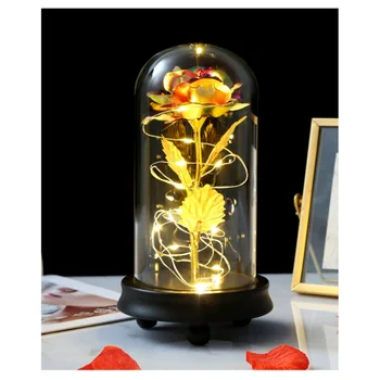 Gold Foil Artificial Rose Flower With LED Light String In Glass Dome On Wooden Base Romantic Valentine's Day Gift For Women 
Gold Foil Artificial Rose Flower With LED Light String In Glass Dome On Wooden Base Romantic Valentine's Day Gift For Women