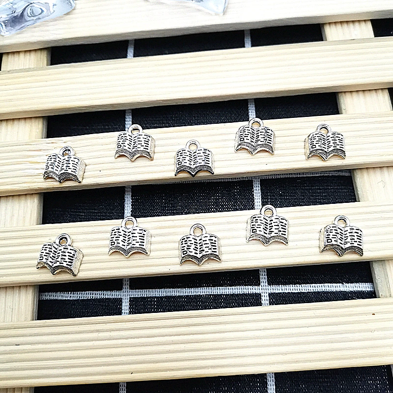 40pcs / 1 Pack DIY Personalized Jewelry Pendant Accessories Silver Mini Book Model Metal Jewelry Keychain Jewelry
40pcs / 1 Pack DIY Personalized Jewelry Pendant Accessories Silver Mini Book Model Metal Jewelry Keychain Jewelry