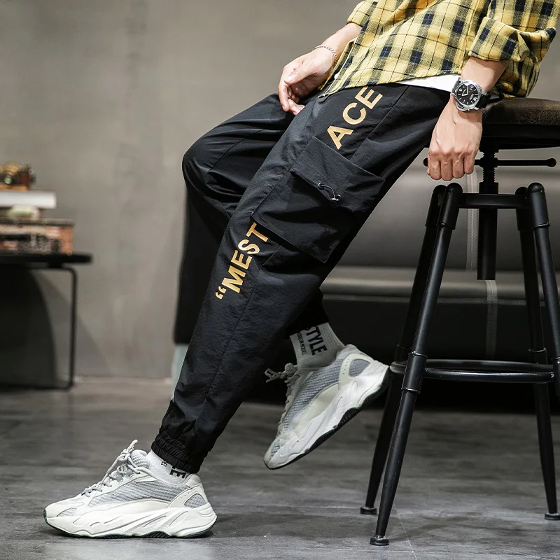 Pants Men Pockets Beam Letters Overalls Men Loose Large Size Wild Drawstring Men Fashion Hip-Hop Nine Points Men Pants
Pants Men Pockets Beam Letters Overalls Men Loose Large Size Wild Drawstring Men Fashion Hip-Hop Nine Points Men Pants