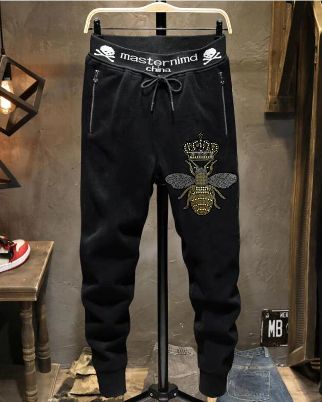 

Thin designer pants Men Sweatpants with Rhinestones asina size M-2XL man pants