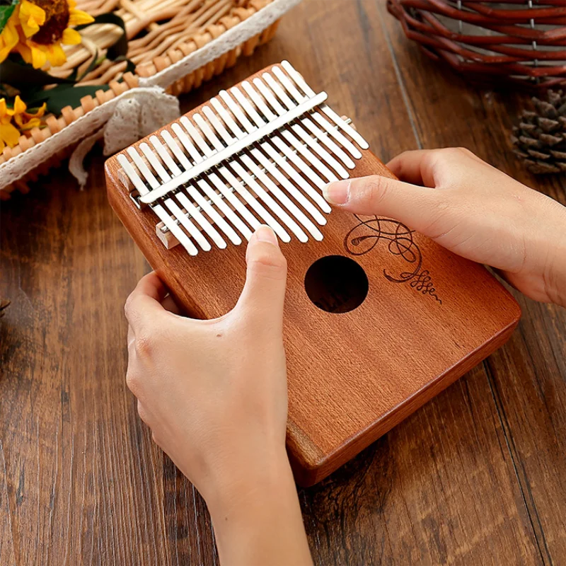High-quality Mahogany Main Kalimba 17-key thumb piano for beginners to provide a good sound and learning book children instrumen
High-quality Mahogany Main Kalimba 17-key thumb piano for beginners to provide a good sound and learning book children instrumen