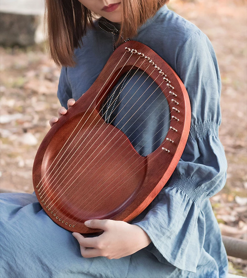 16 strings 16 notes lyre thumb harp portable minority instrument Greek small instrument
16 strings 16 notes lyre thumb harp portable minority instrument Greek small instrument