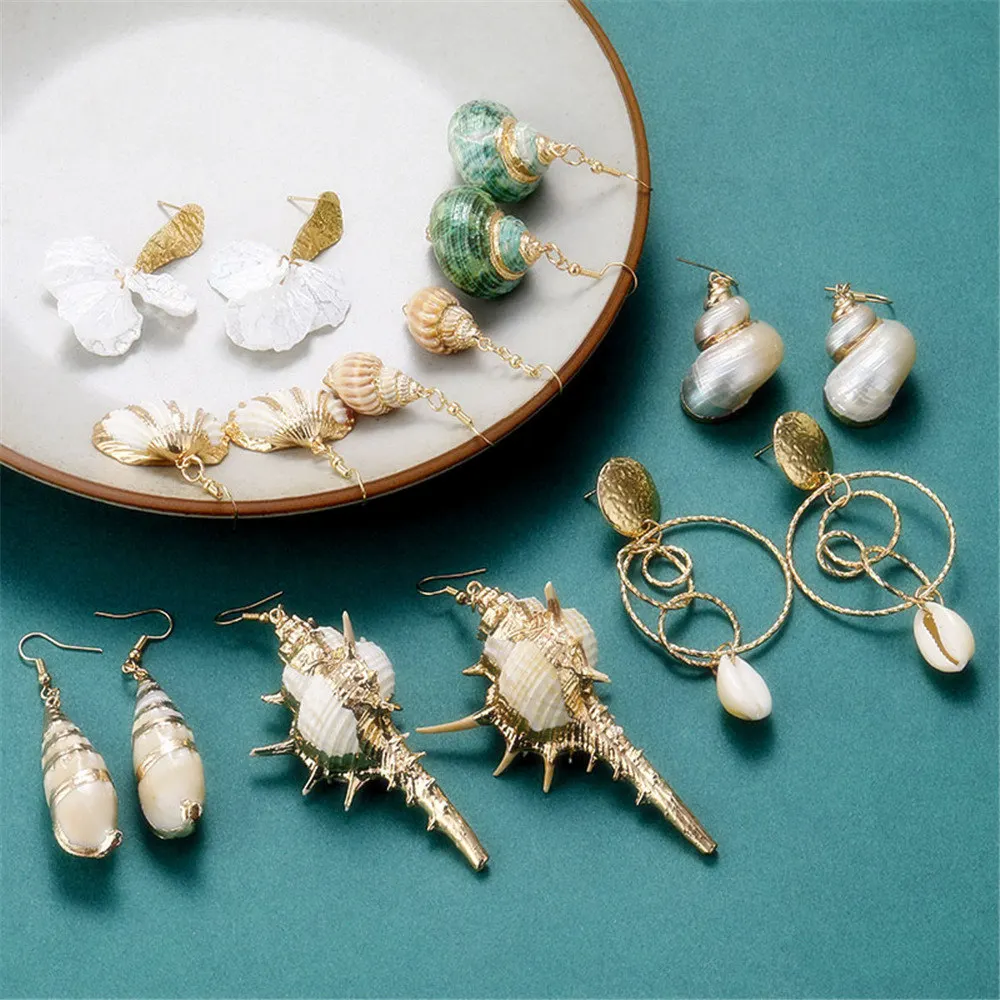 Fashion Brincos Natural Shell Earrings For Women Gold Color Trendy Shell Cowrie Statement Dangle Earrings Bohemian Ocean Jewelry
Fashion Brincos Natural Shell Earrings For Women Gold Color Trendy Shell Cowrie Statement Dangle Earrings Bohemian Ocean Jewelry