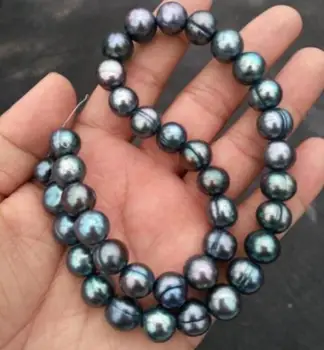 Free shipping 10-11mm natural baroque tahitian peacock green pearl necklace 18inch 
Free shipping 10-11mm natural baroque tahitian peacock green pearl necklace 18inch