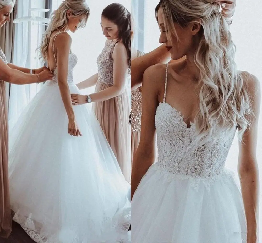 Vestido de Noiva New Wedding Dresses 2020 Backless Lace Appliques Beads Spaghetti Straps Boho Bridal Gowns Robe De Mariee
Vestido de Noiva New Wedding Dresses 2020 Backless Lace Appliques Beads Spaghetti Straps Boho Bridal Gowns Robe De Mariee