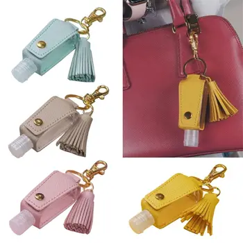 30ml Portable Empty Leakproof Plastic Travel Bottle for Hand Sanitizer with Tassels Leather Keychain Holder Carriers
30ml Portable Empty Leakproof Plastic Travel Bottle for Hand Sanitizer with Tassels Leather Keychain Holder Carriers