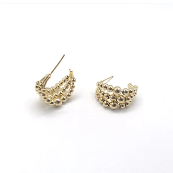 Fashionable C-shaped rolling beads gradient three-layer earrings golden beads earrings
Fashionable C-shaped rolling beads gradient three-layer earrings golden beads earrings