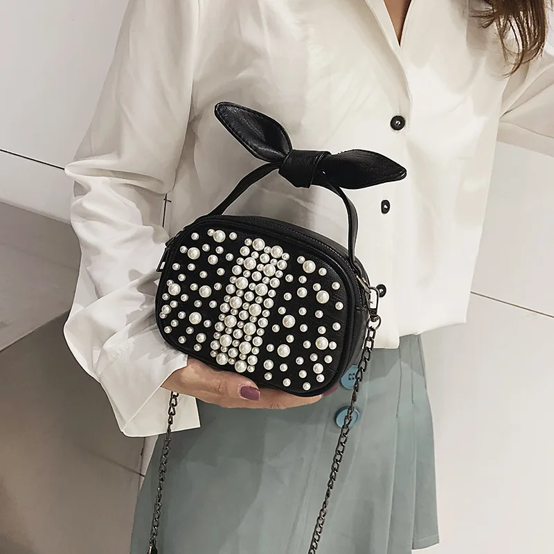 2019 the new Pearl Mingyuanfeng pillow bag butterfly knot ear slanted women's bag on one shoulde
2019 the new Pearl Mingyuanfeng pillow bag butterfly knot ear slanted women's bag on one shoulde