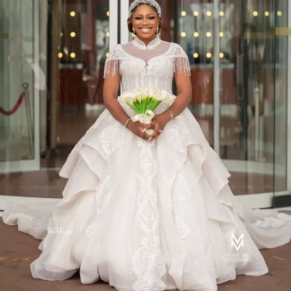 High Neck African Wedding Dresse Short Sleeves Lace Appliqued Beaded Tassel Country Bridal Gowns Plus Size Vestido De Noiva
High Neck African Wedding Dresse Short Sleeves Lace Appliqued Beaded Tassel Country Bridal Gowns Plus Size Vestido De Noiva