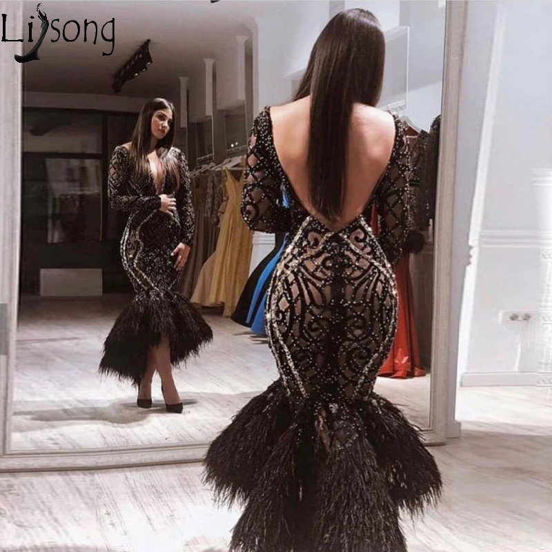 Saudi Arabic Black Lace Beaded Mermaid Evening Dress High Low Ankle Length Long Sleeve Formal Prom Dress with Feathers V Back
Saudi Arabic Black Lace Beaded Mermaid Evening Dress High Low Ankle Length Long Sleeve Formal Prom Dress with Feathers V Back