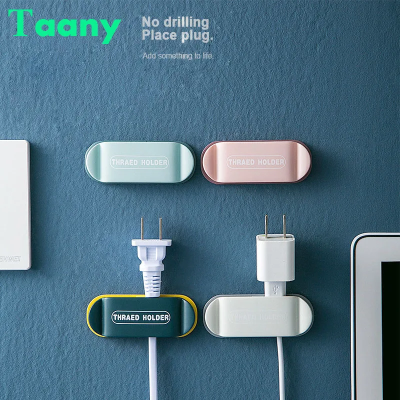TAANY Power plug socket holder wall-mounted self-adhesive hook multifunctional wall hook USB data cable winder earphone receiver 
TAANY Power plug socket holder wall-mounted self-adhesive hook multifunctional wall hook USB data cable winder earphone receiver