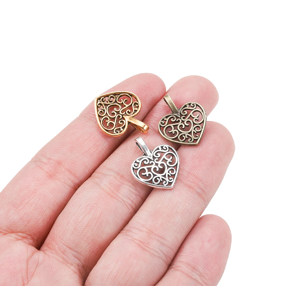 30pcs/lot Tibetan Bronze Plated Hollow Out Heart Antique Pendants Findings DIY Charms Bracelet Jewelry Making Supplies 30pcs/lot Tibetan Bronze Plated Hollow Out Heart Antique Pendants Findings DIY Charms Bracelet Jewelry Making Supplies