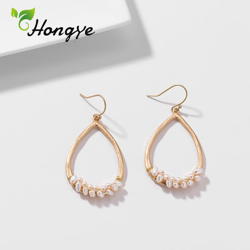 2019 New Arrival Hollow Oval Natural Pearl Earrings for Women Beaded Charm Copper Metal Ear Hooks Romantic Wedding Ear Jewelry
2019 New Arrival Hollow Oval Natural Pearl Earrings for Women Beaded Charm Copper Metal Ear Hooks Romantic Wedding Ear Jewelry