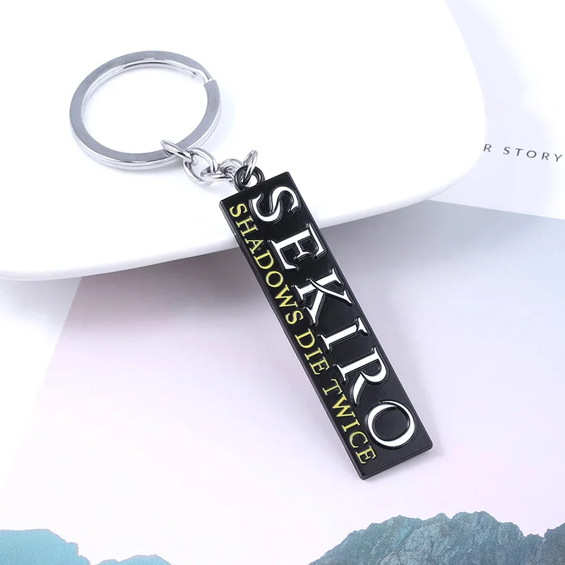 Sekiro Shadows Die Twice Keychain Letter Logo Geometric Key Chain for Women Men Personalized Car Keyring Jewelry
Sekiro Shadows Die Twice Keychain Letter Logo Geometric Key Chain for Women Men Personalized Car Keyring Jewelry