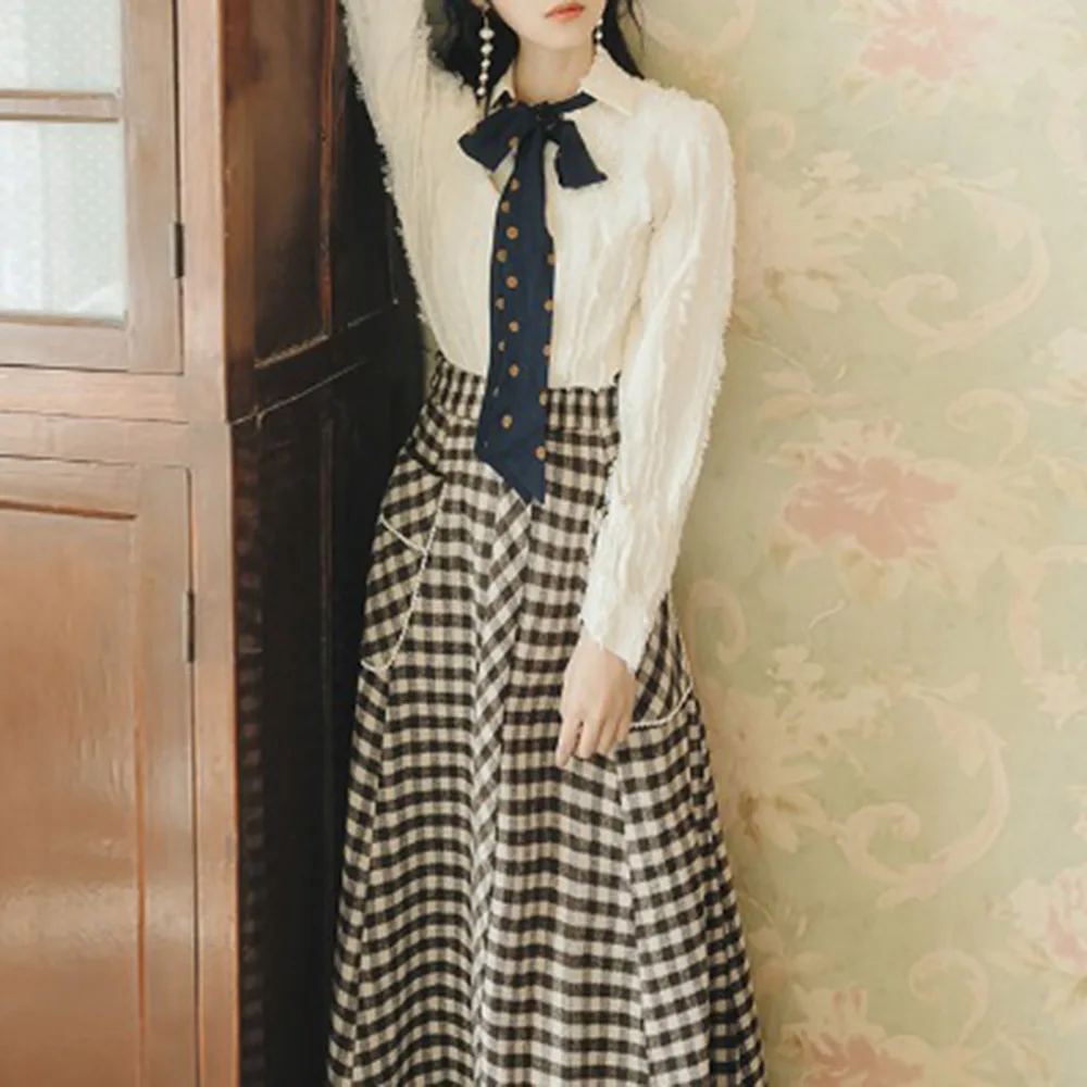 Autumn new French retro shirt plaid skirt French small autumn and winter suit female two-piece
Autumn new French retro shirt plaid skirt French small autumn and winter suit female two-piece