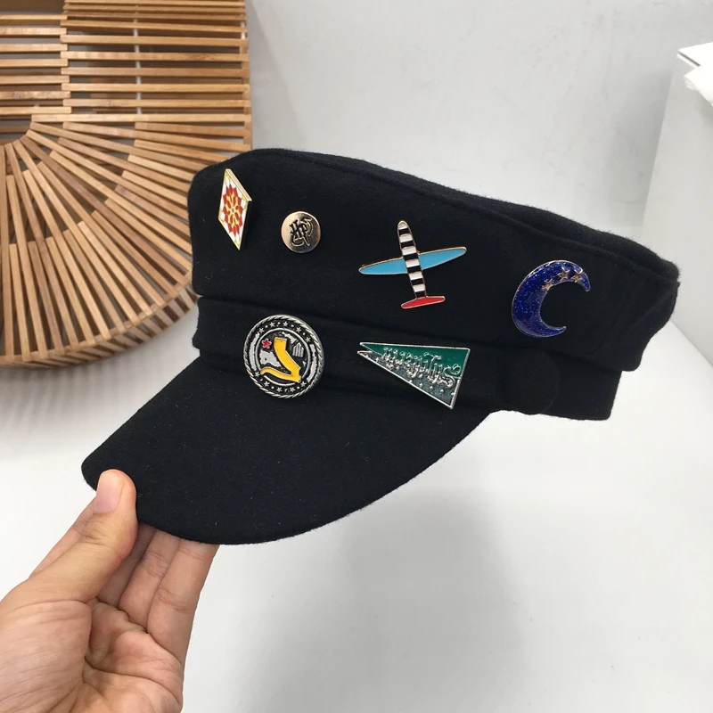 Autumn and winter new woolen navy badge hat cap beret student Korean version of wild tide fashion
Autumn and winter new woolen navy badge hat cap beret student Korean version of wild tide fashion