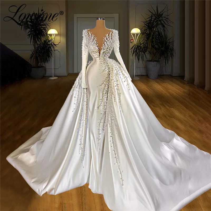 Muslim Long Luxury Wedding Dresses 2020 Pearls Beading Elegant Long Sleeves Dubai Bridal Gowns 2020 Newest Wedding Gowns
Muslim Long Luxury Wedding Dresses 2020 Pearls Beading Elegant Long Sleeves Dubai Bridal Gowns 2020 Newest Wedding Gowns