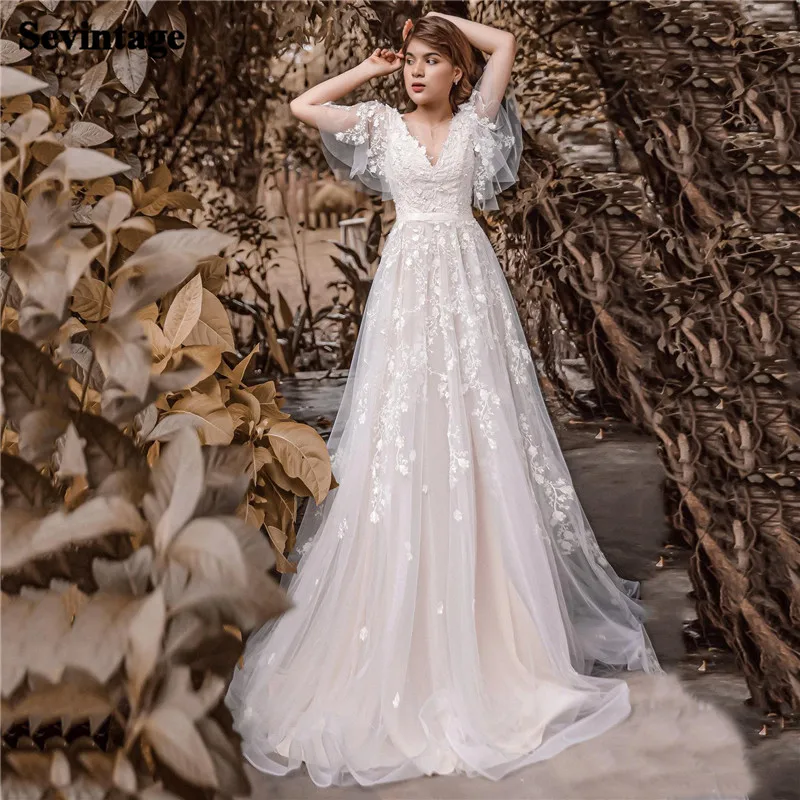 Chic Boho Wedding Dress2021 Lorie Lace Appliques Bride Dresses Cap Sleeves Long Train Princess Beach Women Dresses For Wedding
Chic Boho Wedding Dress2021 Lorie Lace Appliques Bride Dresses Cap Sleeves Long Train Princess Beach Women Dresses For Wedding