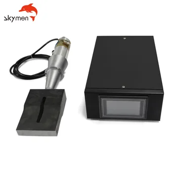 15KHZ Ultrasonic generator 2600W continuous working wave spot welding machine with transducer and horn mold welding generator
15KHZ Ultrasonic generator 2600W continuous working wave spot welding machine with transducer and horn mold welding generator