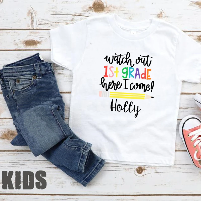 Watch Out First Grade Here T-Shirts Print Come 1st Grade Personalized Back To School Shirt Girl Pencil Name Family Clothes
Watch Out First Grade Here T-Shirts Print Come 1st Grade Personalized Back To School Shirt Girl Pencil Name Family Clothes