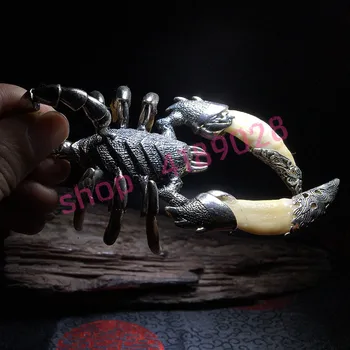 Natural Tibetan silver inlaid with wolf teeth, Scorpion King shape ornaments, handicrafts accessories
Natural Tibetan silver inlaid with wolf teeth, Scorpion King shape ornaments, handicrafts accessories