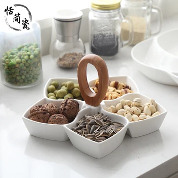 Ceramic dried fruit plate modern minimalist snacks melon seeds nuts dish living room home flower style snack white candy box
Ceramic dried fruit plate modern minimalist snacks melon seeds nuts dish living room home flower style snack white candy box