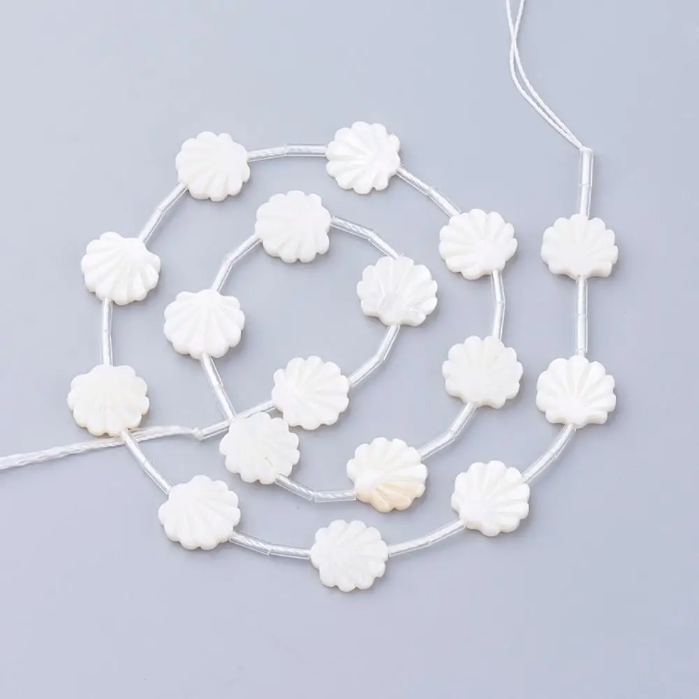 White Shell Beads, Shell Shaped, Seashell,Size: about 12mm long, 12mm wide, 3mm thick, hole: 1mm.
White Shell Beads, Shell Shaped, Seashell,Size: about 12mm long, 12mm wide, 3mm thick, hole: 1mm.