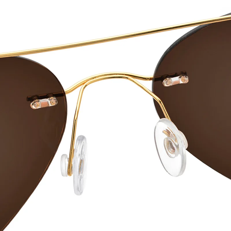 Солнцезащитные очки без оправы титановые TR90 женские 2020 популярные Роскошные