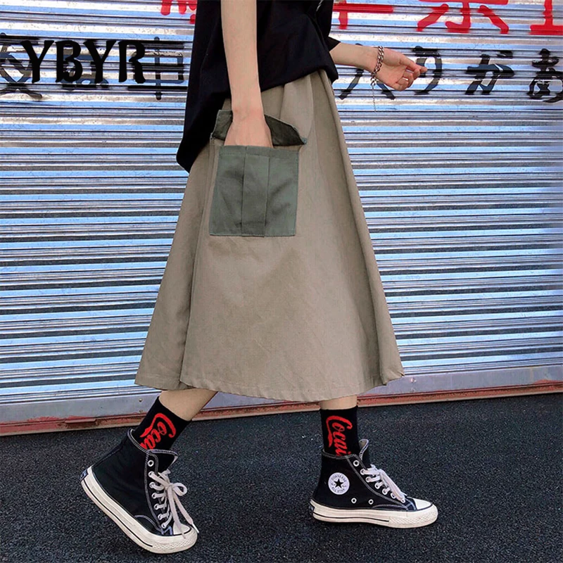 Harajuku Cargo Skirt Goth Punk Buckle High Waist Side Pocket Loose Skirt Grunge Kpop Casual Midi Skirt Women Fashion Streetwear
Harajuku Cargo Skirt Goth Punk Buckle High Waist Side Pocket Loose Skirt Grunge Kpop Casual Midi Skirt Women Fashion Streetwear