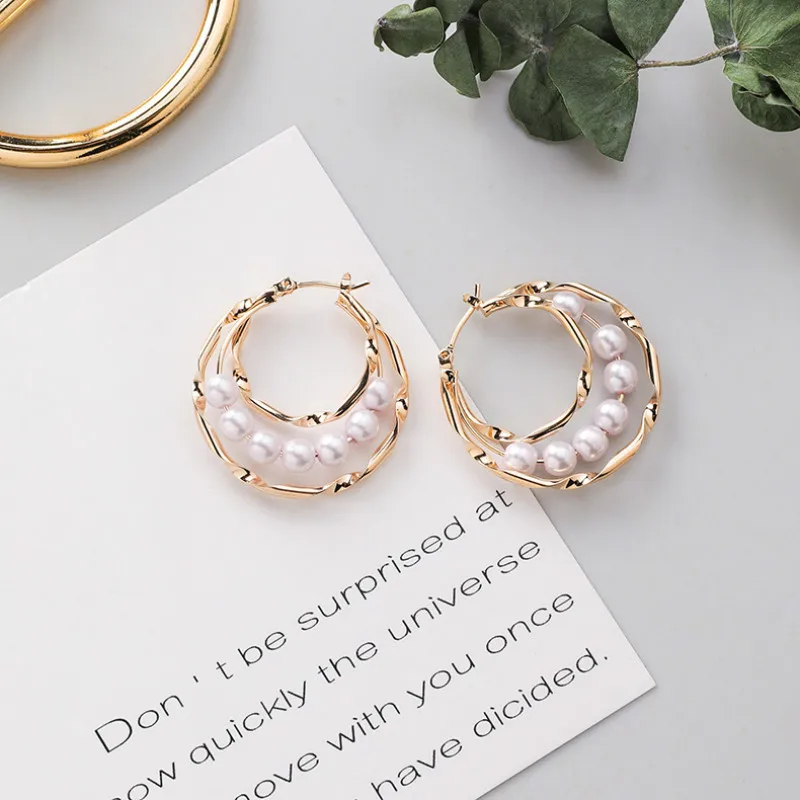 Korean New Fashion Personality Simple Design Pearl Multi-layer Ring Earrings Sweet Temperament Popular Earrings Female Jewelry
Korean New Fashion Personality Simple Design Pearl Multi-layer Ring Earrings Sweet Temperament Popular Earrings Female Jewelry