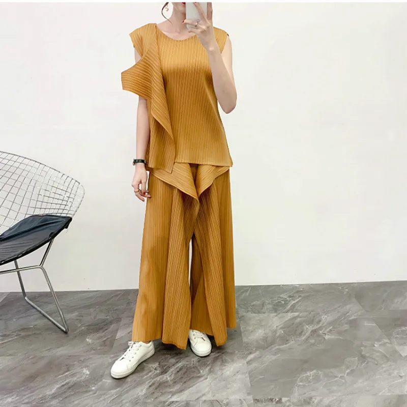 Plus Size Pant Suits Women 2020 Spring New Elastic Miyake Pleated Round Neck Sleeveless Irregular Tank Top + Wide Leg Pants Set
Plus Size Pant Suits Women 2020 Spring New Elastic Miyake Pleated Round Neck Sleeveless Irregular Tank Top + Wide Leg Pants Set