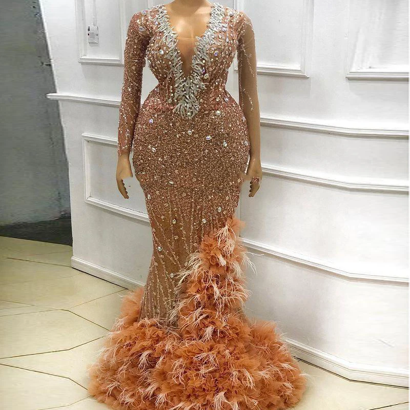 Luxury Mermaid Evening Dresses V Neck Crystals Beads Appliques Aso Ebi Prom Dress Plus Size Party Gown Feathers Tulle Bottom 
Luxury Mermaid Evening Dresses V Neck Crystals Beads Appliques Aso Ebi Prom Dress Plus Size Party Gown Feathers Tulle Bottom