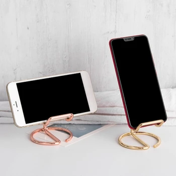 Simple but Effective Mobile Phone Holder Tablet Holder Stand Mount Display Table Holder Universal for iphone
Simple but Effective Mobile Phone Holder Tablet Holder Stand Mount Display Table Holder Universal for iphone